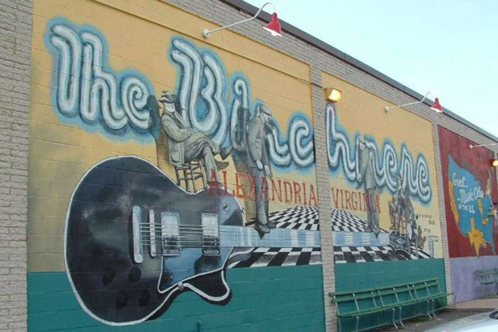 A mural of a guitar and the words "The Birchmere." 