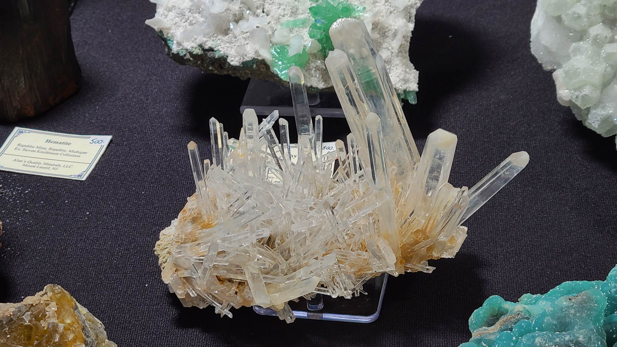 A specimen of clear quartz with halloysite. 